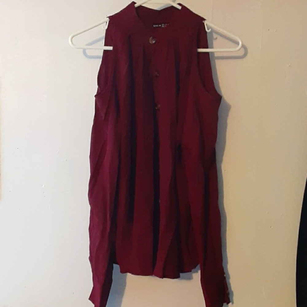 Long sleeve, open shoulder, blouse.